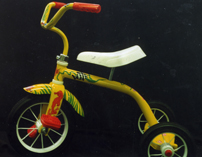 custom painted yellow tricycle